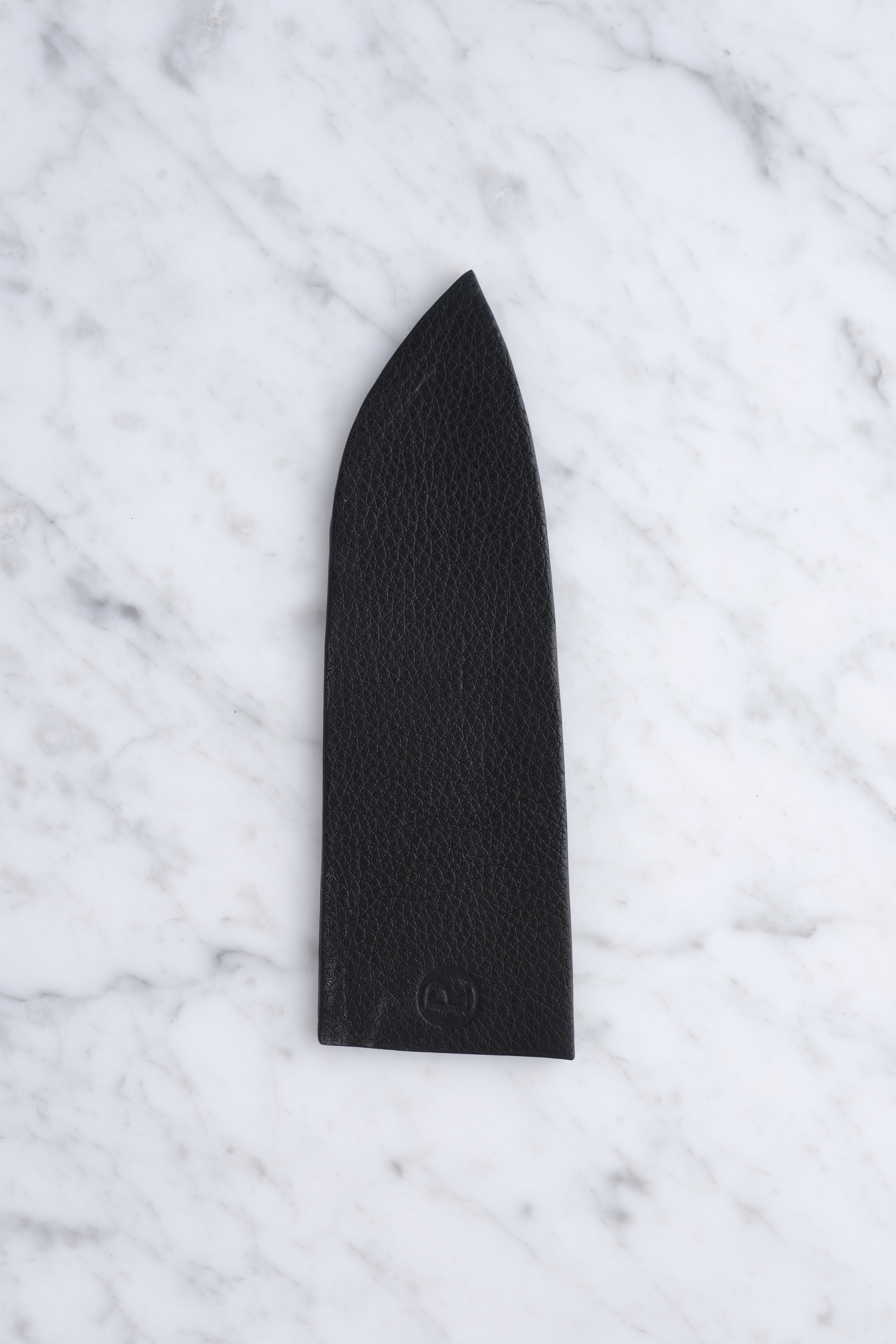 Ole Rudegaard Leather says - 165mm Santoku