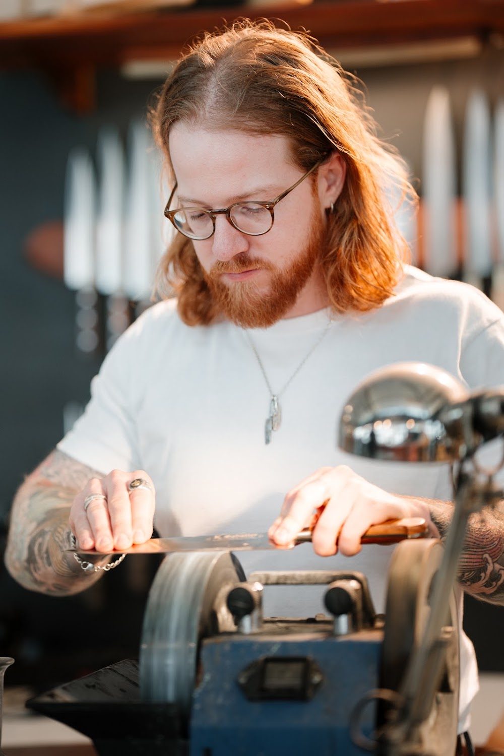 Troels sharpening a knife at the in-store sharpening station